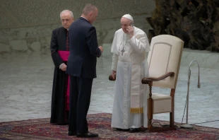 Pope Francis spoke on the phone at the end of his general audience Aug. 11, 2021. Daniel Ibanez/CNA.